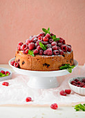 Raspberry yoghurt cake on a cake stand