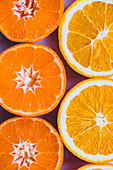 Scheiben von Mandarine und Orange, formatfüllend