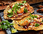 Grilled wraps with prawns, chilli peppers and coriander