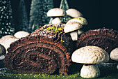 A dark chocolate Yule log with meringue mushrooms