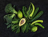 Raw green vegetables set - Broccoli, avocado, pepper, spinach, zuccini and lime