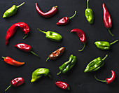 Pattern of small colorful hot chili peppers