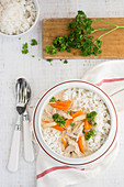 Rice with chicken sauce with vegetables and chicken