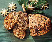 Fruit loaf, sliced on a wooden surface