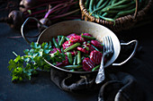 Beetroot gnocchi with green beans
