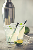 Refreshing summer alcoholic cocktail margarita with crushed ice and citrus fruits