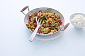 Fried Chinese cabbage with peppers, spring onions and diced ham
