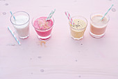 Grape and almond drink; raspberry and coconut flip; melon and cucumber drink, and papaya and walnut drink