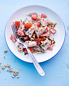 Fish salad with tomatoes and cream cheese