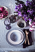 Laid table in purple and violet