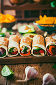 Tortilla wraps with vegetables, Mexican tortillas, Tacos with nachos and vegetables