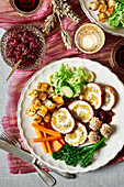 Turkey roulade with vegetables and roasted potatoes for Christmas