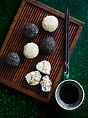 Black and white tuna and avocado sushi balls
