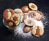 Black-and-white biscuits with icing sugar for Christmas