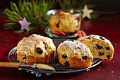Small round orange stollen with icing baked in jars