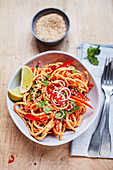 Sweet potato noodles with peppers and coriander