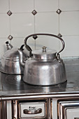 Kettle on hob of traditional wood-fired cooker
