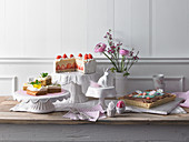 Easter cake buffet with caramel and strawberry cake, almond nougat tart and carrot cake