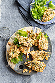 Stuffed, fried sardines in an almond and fennel coating