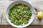 Vegan quinoa salad with kale and zucchini