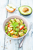 A salad with apples, celery, avocado and walnuts (low carb lunch)