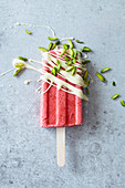 Strawberry Ice Lolly with white chocolate and pistachios