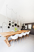 Wooden table and classic chairs in dining room