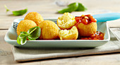 Arancini (fried rice balls) with tomato sauce