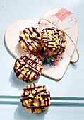 Christmas cookies filled with jam and drizzled with chocolate