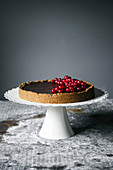 Chocolate hazelnut tart with redcurrants