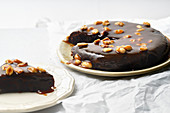 Brownie cake with salted caramel and roasted peanuts
