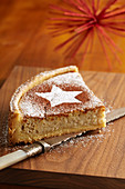 A piece of baked apple cake for Christmas