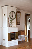 White tiled stove with Christmas decorations