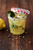 Preserved lemon slices with herbs and spices