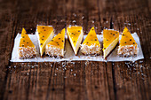 Coconut cheesecake with passion fruit jelly