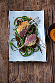 Lamb chops with a ginger crust, yard-long beans and mashed sweet potato