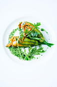 Stuffed courgette flowers with rocket