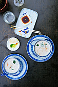 Coconut soup with coriander in chinese bowls