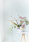 Delicate flower arrangement with astrantia and eucalyptus