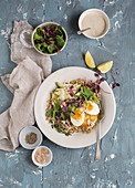 A breakfast bowl with barley, halloumi and hard-boiled eggs