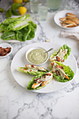 Lettuce wraps with grilled chicken and green dressing
