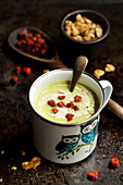 Green Vegetable Soup in a Mug, Garnished with Fried Chorizo Sausage