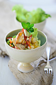 Oriental couscous salad with chicken breast and coconut