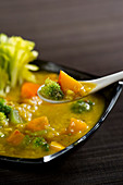 Vegan vegetable stew with pumpkin and broccoli