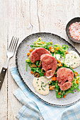 Bavarian pork knuckles with savoy cabbage and horseradish sauce