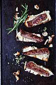 Grilled lamb fillet with lemon and thyme butter served with sliced of bread