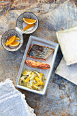 Grilled salmon steaks with orange and fennel (seen from above)