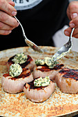 Grilled veal steaks with herb butter