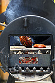 Asian style chicken breast on a grill