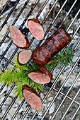 Grilled venison smoked on an open fire